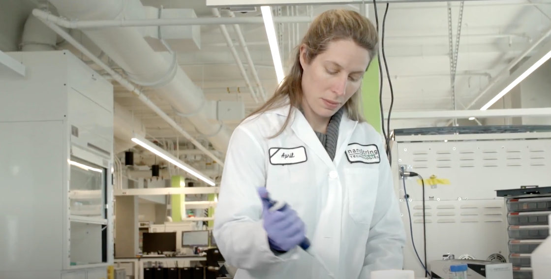 Researcher with a pipette