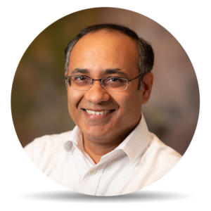 Circular portrait of Vikram Devgan